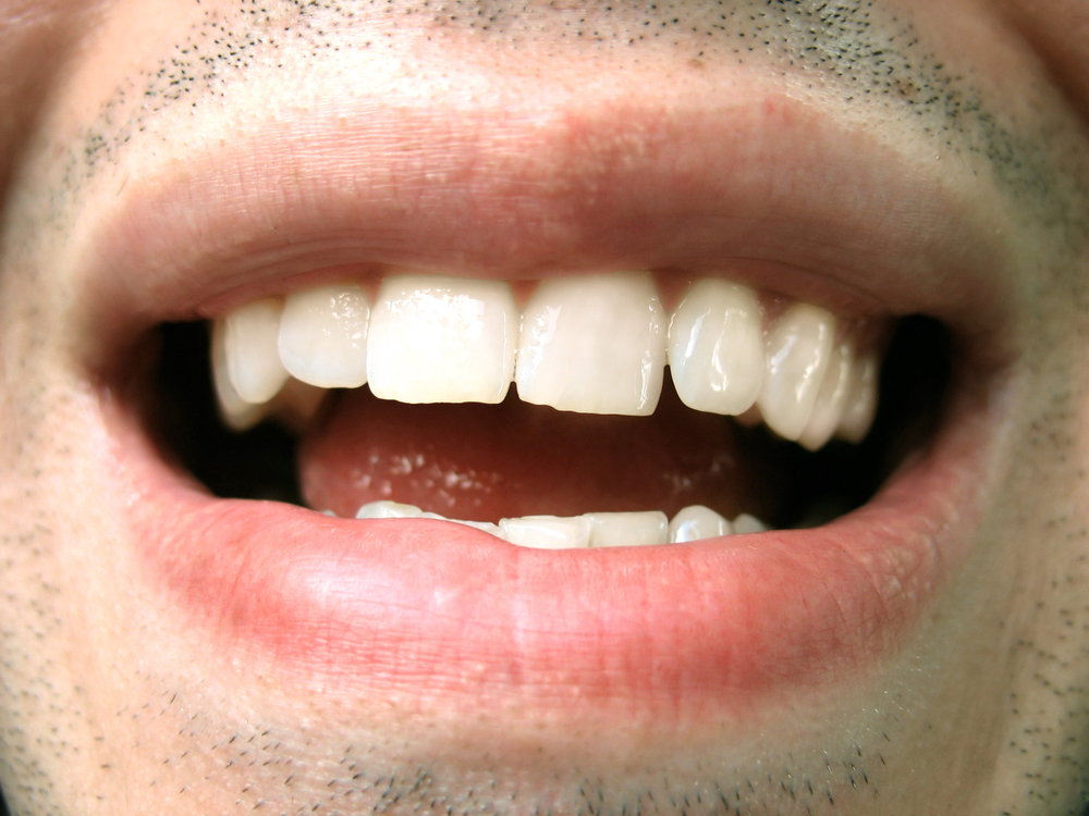 Close up of man's mouth as he talks