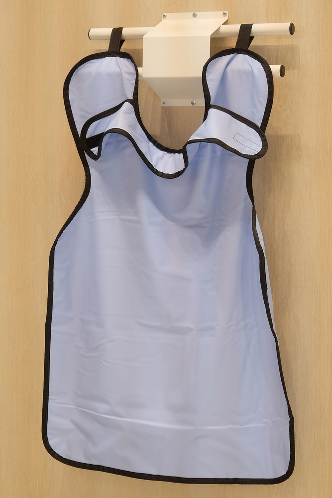 Protective apron for dental patients worn during dental X-rays