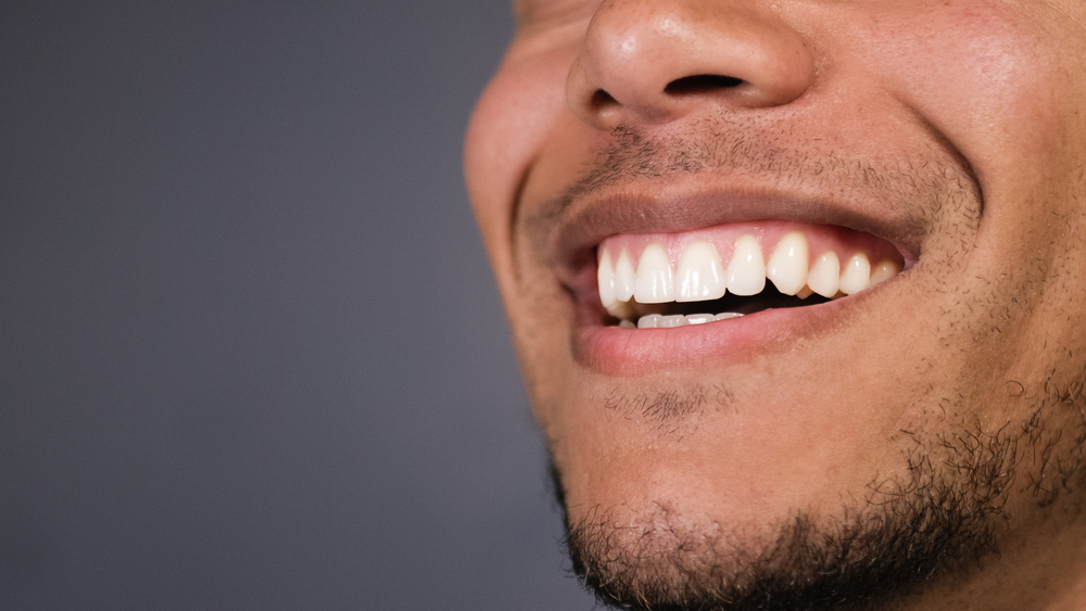 Close up of man's smile healthy teeth