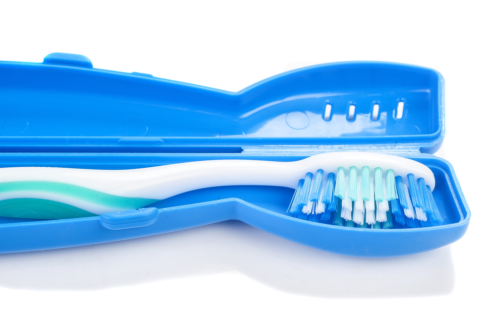 Toothbrush in blue travel case