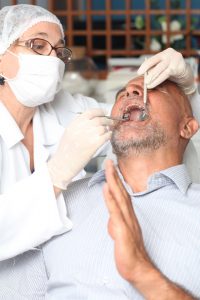 Man Wins $675K Settlement From Dentist After Tool Dropped Down Throat