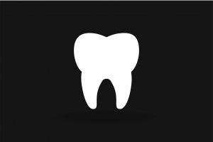 black and white tooth icon