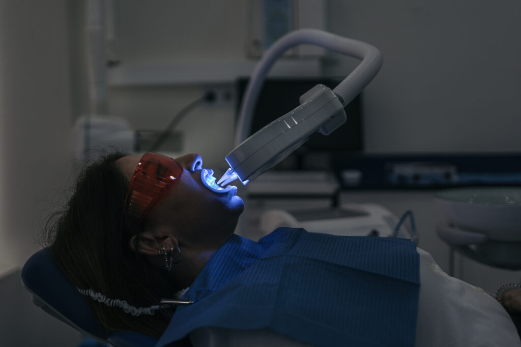 women getting teeth whitening treatment