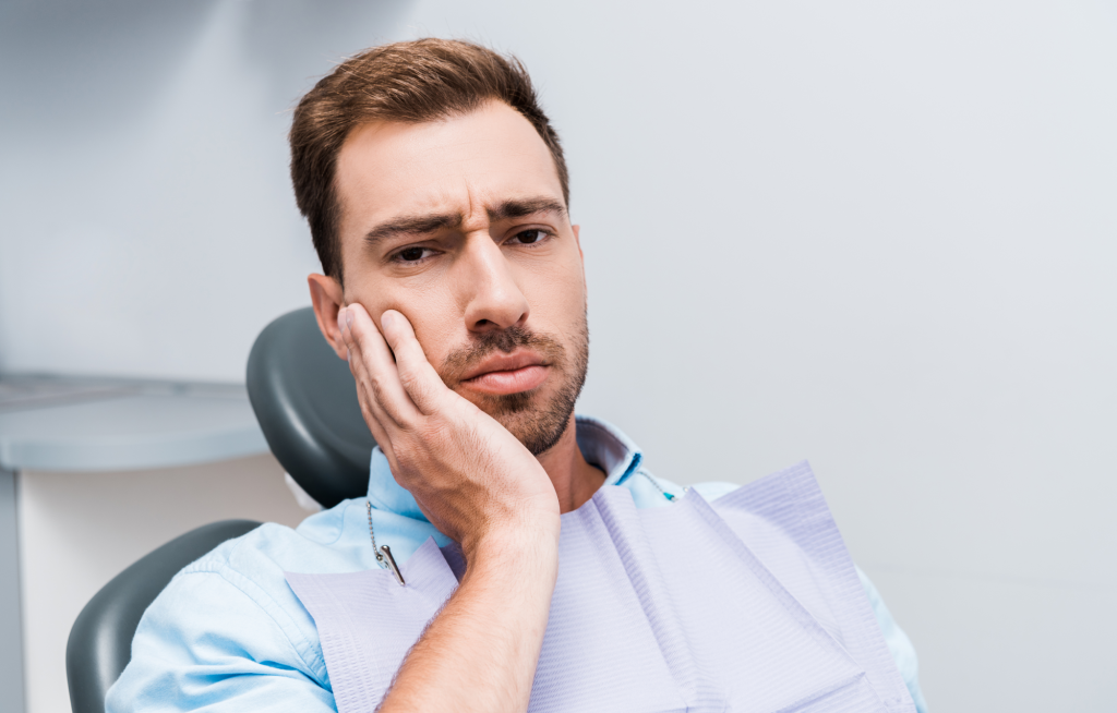 Man With Toothache Before LANAP Surgery
