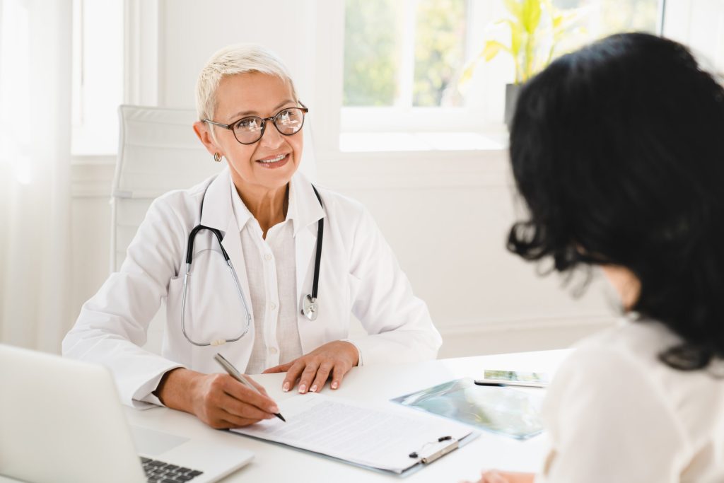 dentist prescribing medication to a client