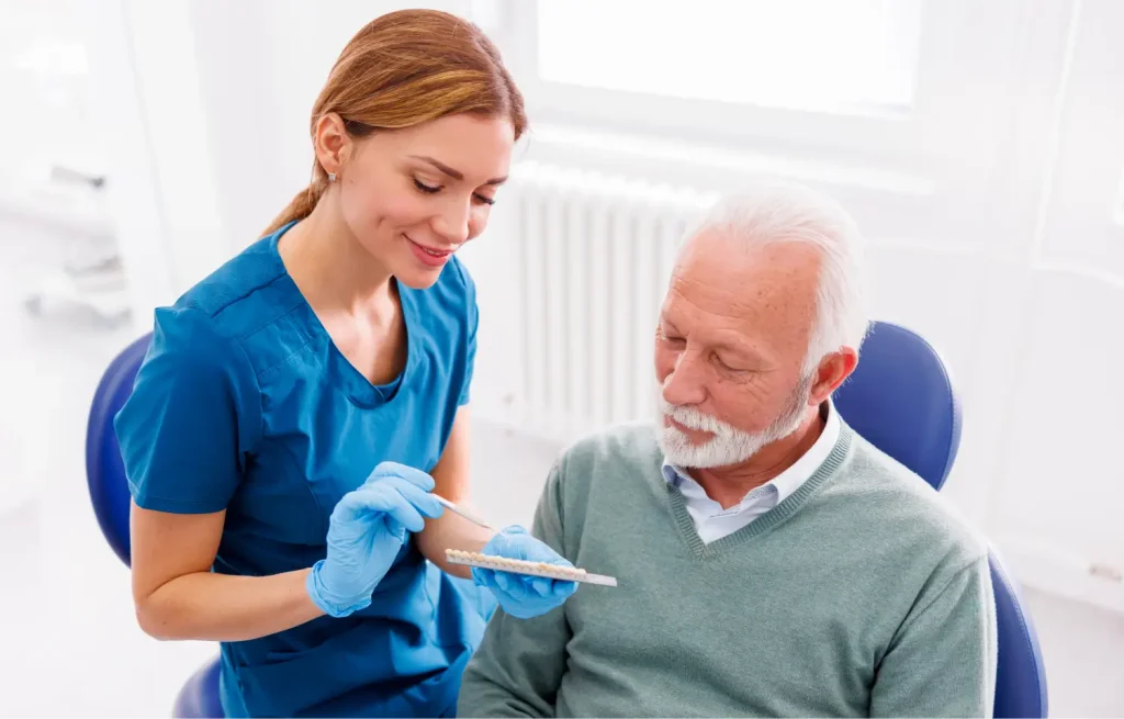 a man looking at options for dental implants