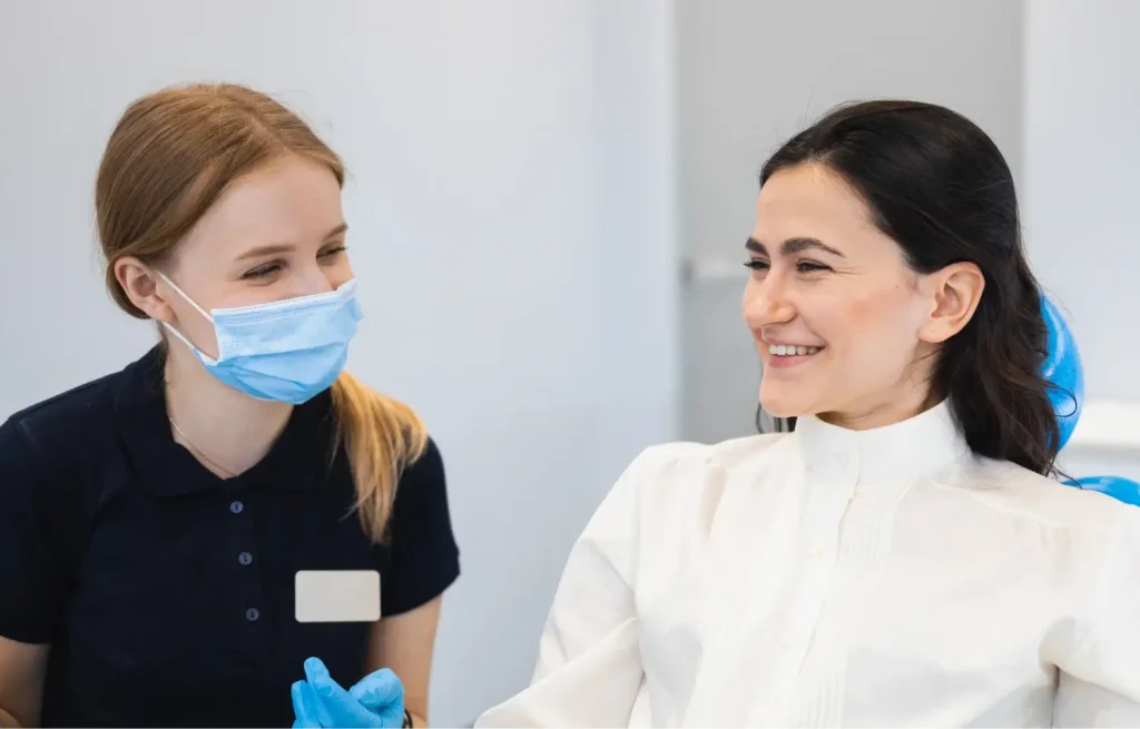 dentist talking to her patient