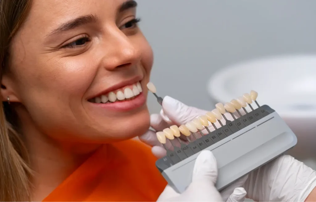 a woman having veneers applied