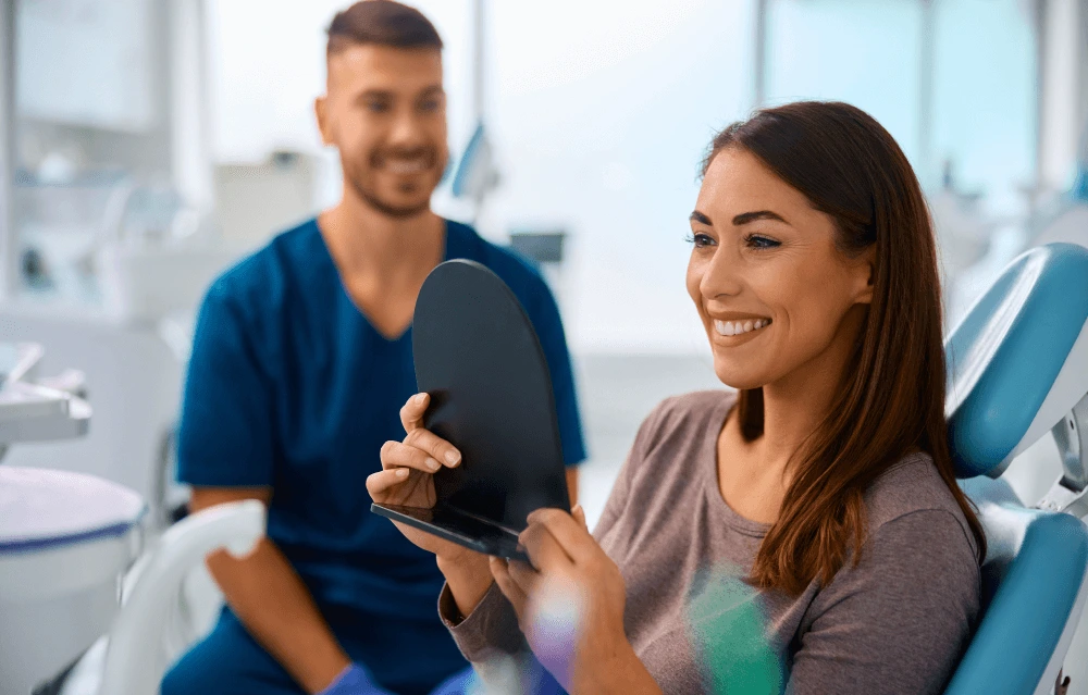 a relaxed patient smiling after dental treatment